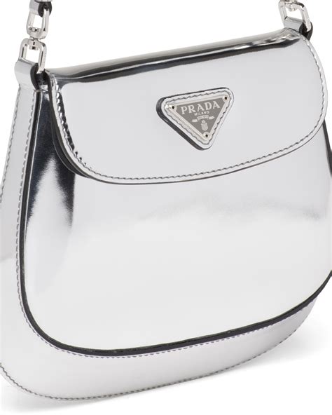 silver Prada handbags